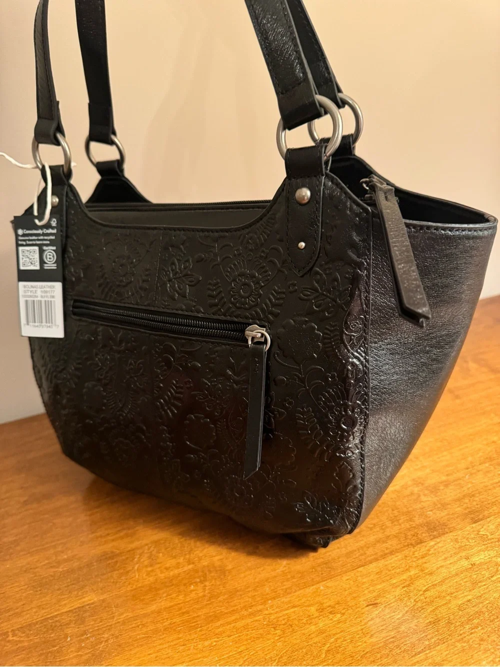 The Sak Bolinas Satchel in Black Floral Embossed Leather